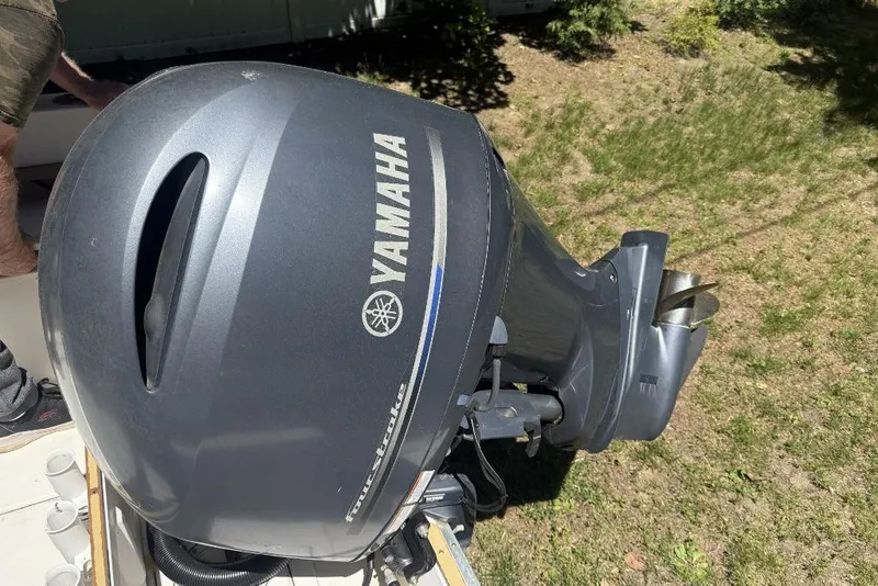 Slide: The Image of Yamaha outboard motor on a 1987 Grady-White Seafarer 226 boat. - 4