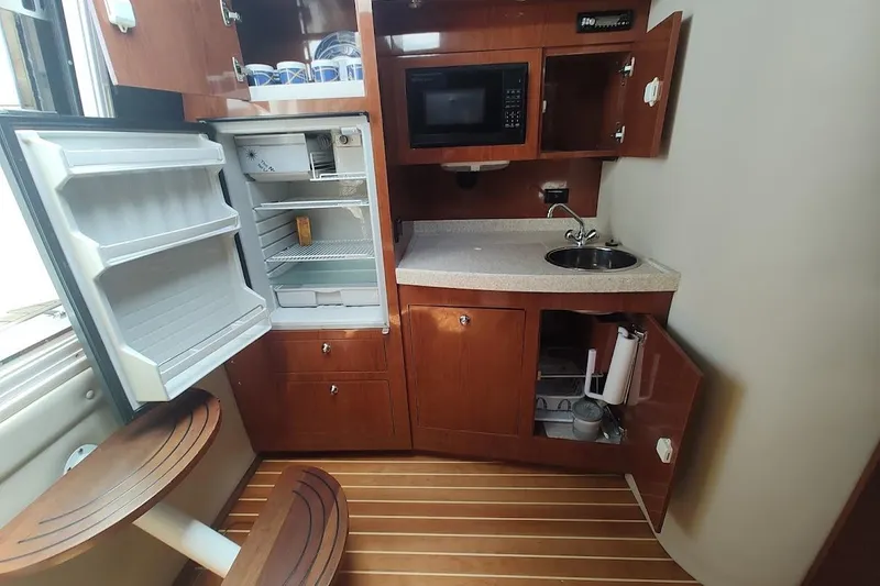 Slide: The Image of Kitchen area of Regal Commodore 3560 IO yacht, year 2006. - 21