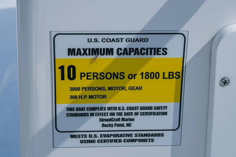 Slide: The Image of U.S. Coast Guard capacity label for 2026 Privateer 2100 Roamer, 10 persons or 1800 lbs. - 18