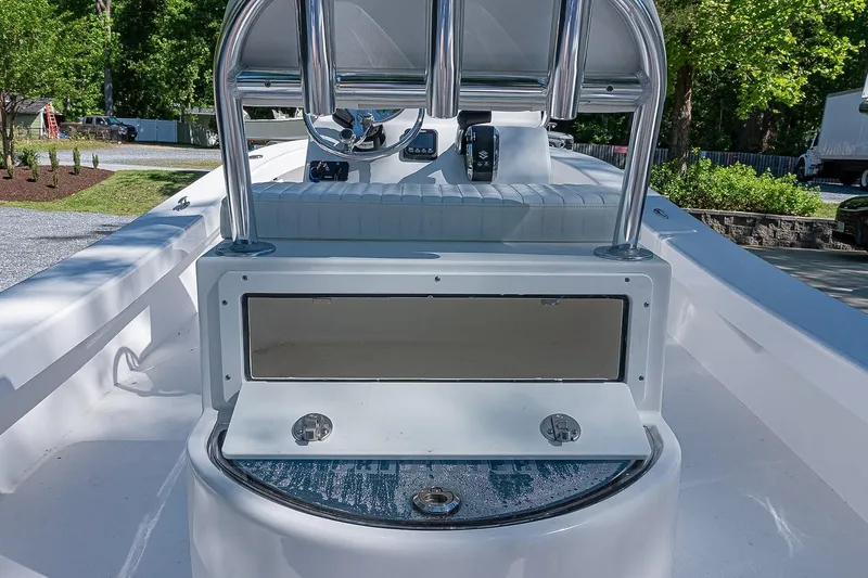 Slide: The Image of 2026 Privateer 2100 Roamer boat interior with sleek console and seating. - 7