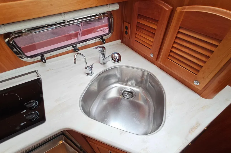 Slide: The Image of Stainless steel sink in 2015 Sabre 42 Salon Express yacht kitchen. - 43