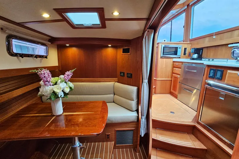 Slide: The Image of Luxurious interior of 2015 Sabre 42 Salon Express yacht with elegant wood finish. - 47