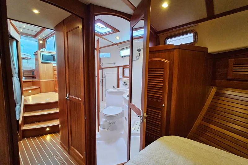 Slide: The Image of Luxurious interior of 2015 Sabre 42 Salon Express yacht with wood finish and modern amenities. - 53
