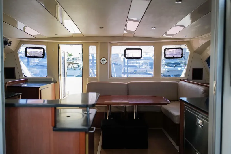 Slide: The Image of Interior of 2012 Leopard 44 yacht with spacious seating and modern design. - 11