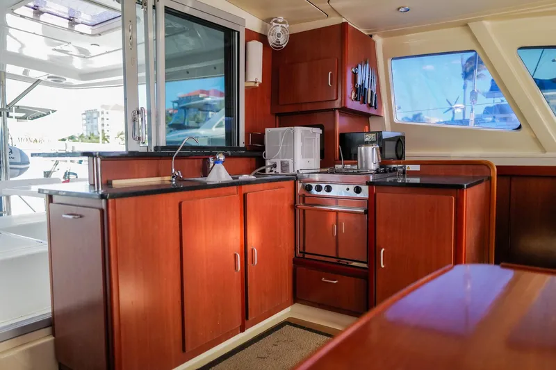 Slide: The Image of Luxurious kitchen interior of a 2012 Leopard 44 yacht with modern appliances. - 15