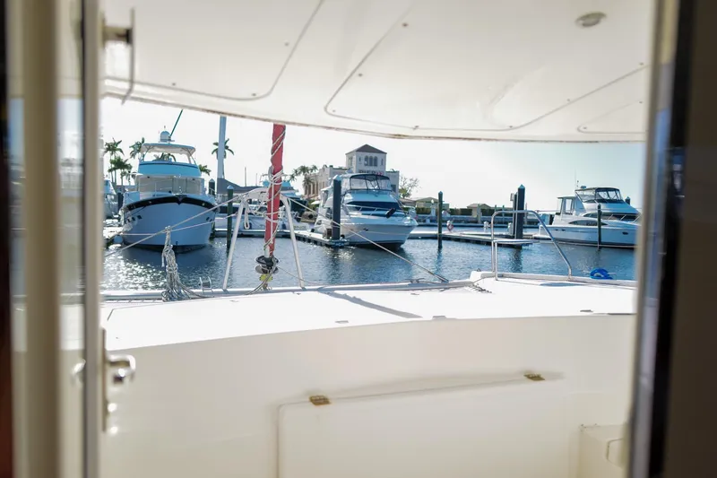 Slide: The Image of View from a 2012 Leopard 44 yacht, overlooking a marina with docked boats. - 31
