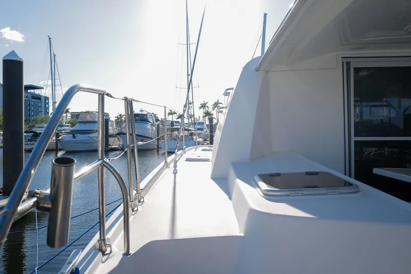 Slide: The Image of Deck view of a 2012 Leopard 44 yacht docked at a marina. - 37