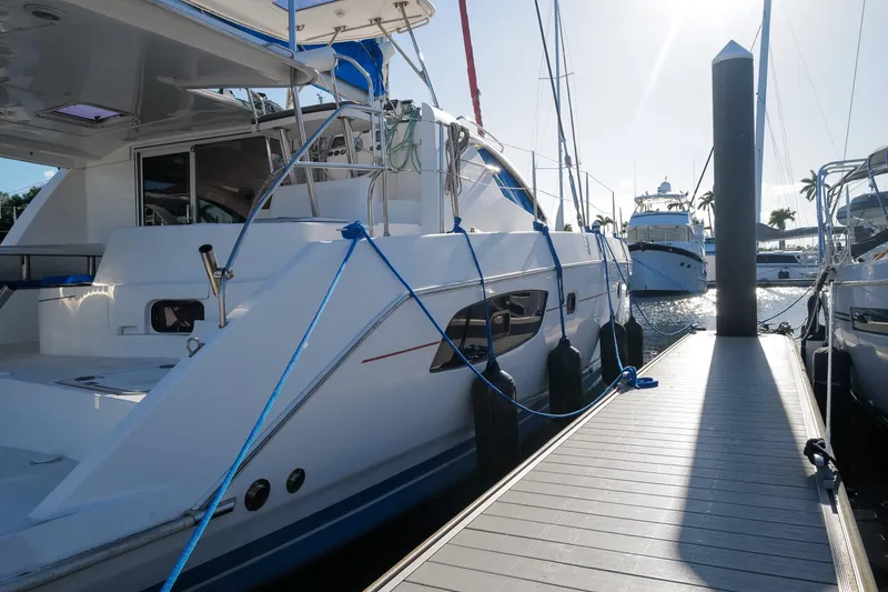 Slide: The Image of Leopard 44 catamaran docked at marina, sunny day, 2012 model. - 41