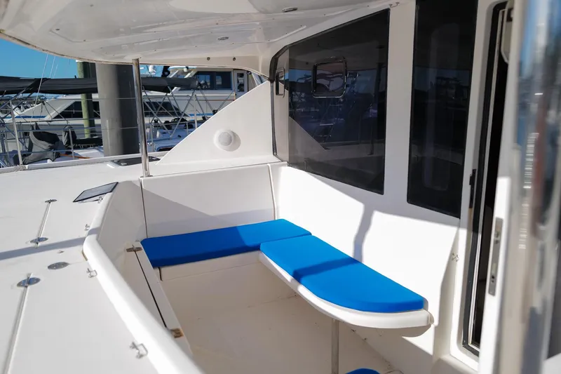 Slide: The Image of Leopard 44 yacht cockpit with blue cushioned seating, 2012 model. - 9