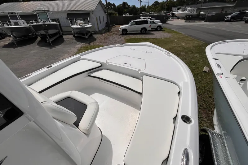 Slide: The Image of 2026 Tidewater 2210 Carolina Bay boat with spacious seating and sleek design. - 8