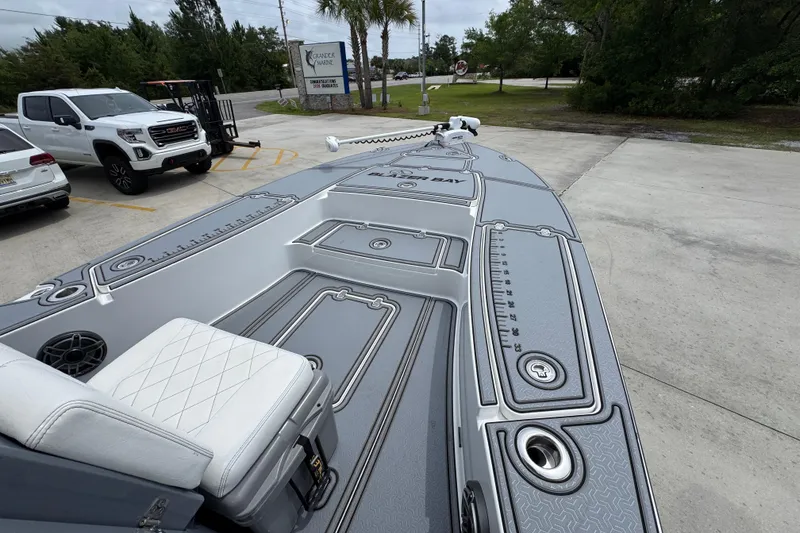 Slide: The Image of 2023 Blazer 2550 GTS boat with sleek deck design at Grander Marine dealership. - 16