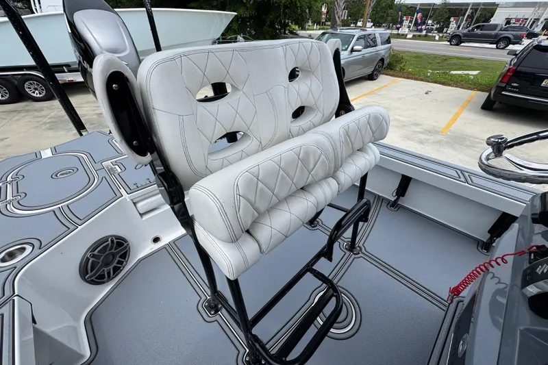 Slide: The Image of 2023 Blazer 2550 GTS boat with cushioned seating and sleek interior design. - 28