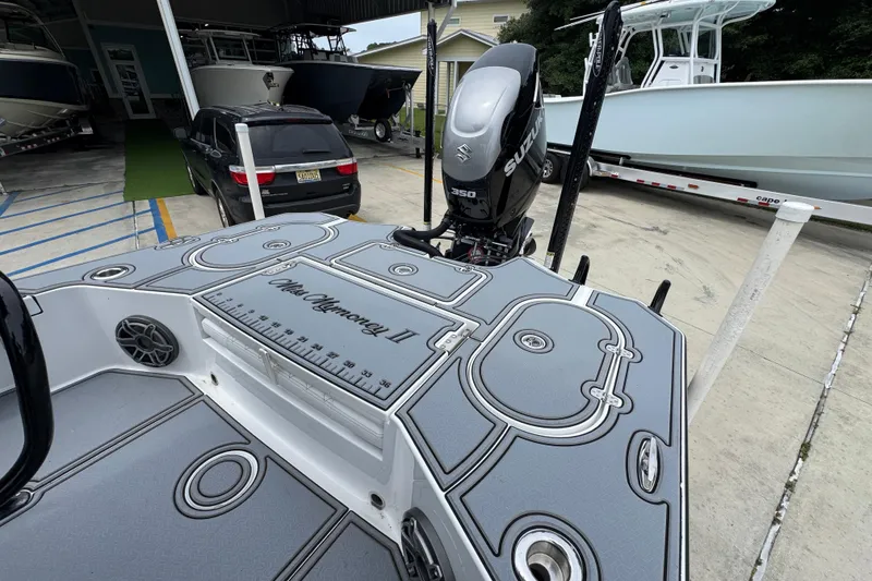 Slide: The Image of 2023 Blazer 2550 GTS boat with Suzuki 350 engine at a marina. - 34