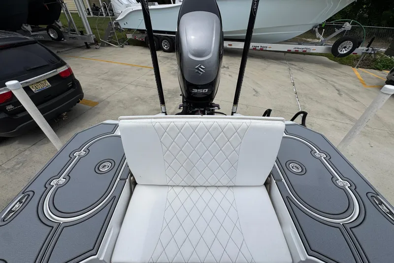 Slide: The Image of 2023 Blazer 2550 GTS boat with Suzuki 350 engine, featuring elegant seating and deck design. - 36