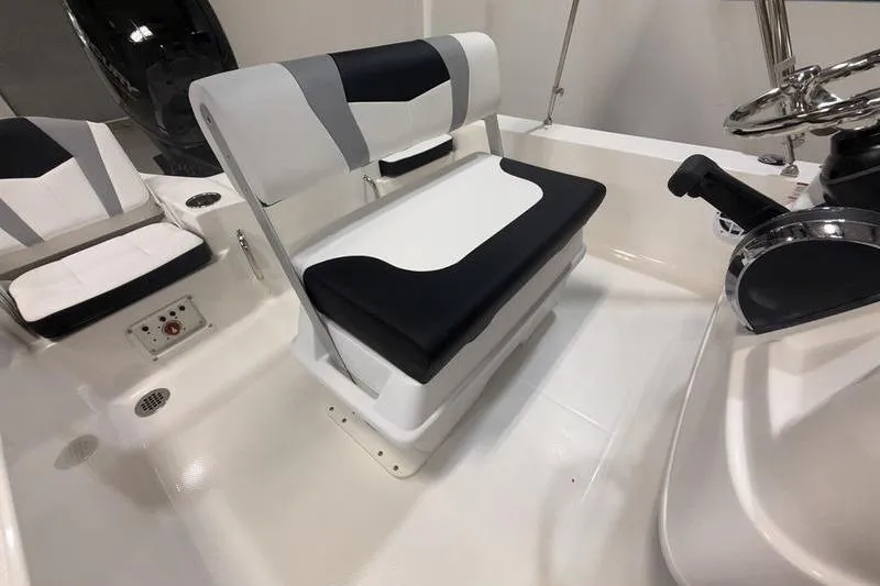 Slide: The Image of Interior of 2026 Robalo 206 Cayman featuring modern seating. - 10