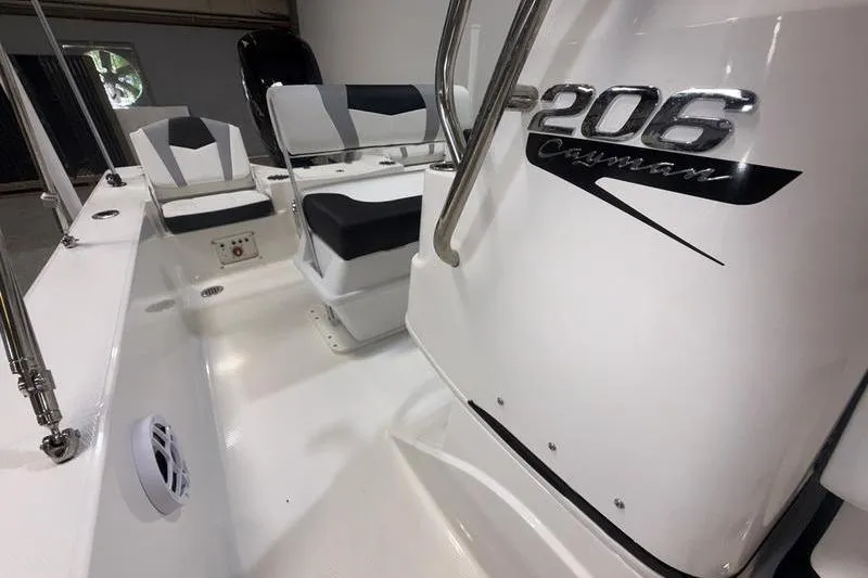 Slide: The Image of Interior of 2026 Robalo 206 Cayman boat with seating. - 12
