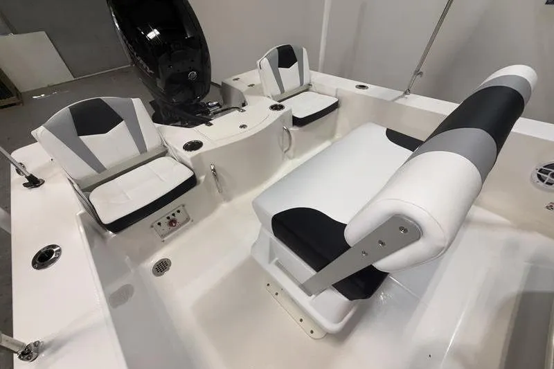 Slide: The Image of Interior of 2026 Robalo 206 Cayman with modern seating. - 6