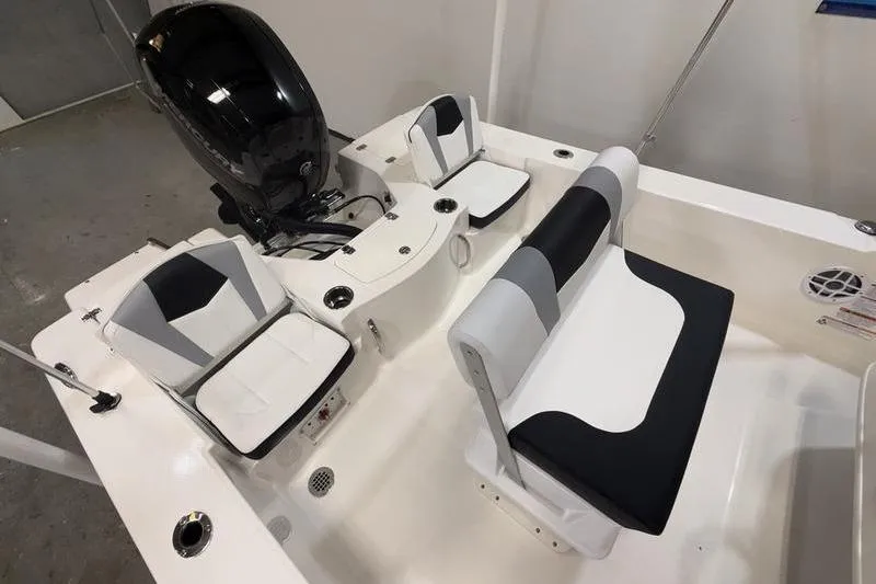 Slide: The Image of Interior of 2026 Robalo 206 Cayman with modern seating. - 8