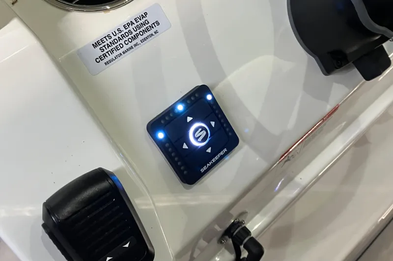 Slide: The Image of Control panel on 2025 Regulator 28 boat, featuring Seakeeper stabilization system. - 10