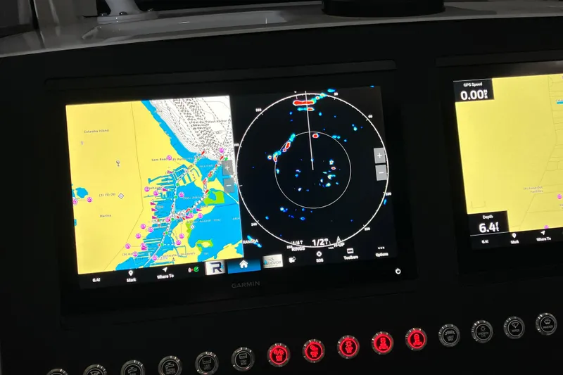 Slide: The Image of Garmin navigation display on 2025 Regulator 28 boat, showing radar and map. - 7