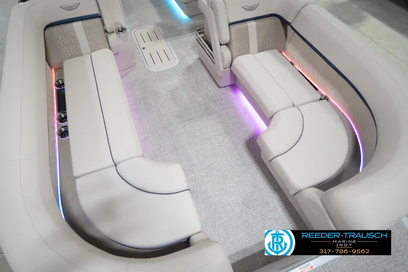 Slide: The Image of Luxurious interior of 2026 Bennington 22 ML pontoon boat with ambient LED lighting. - 14