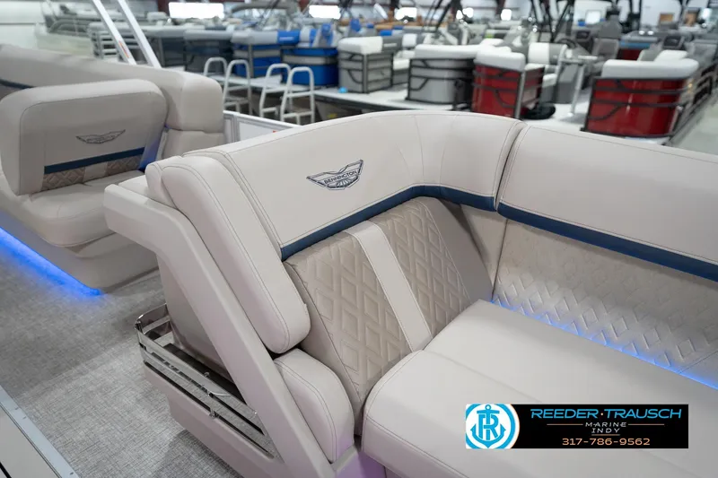 Slide: The Image of Luxurious seating on a 2026 Bennington 22 ML boat, featuring elegant upholstery and ambient lighting. - 28