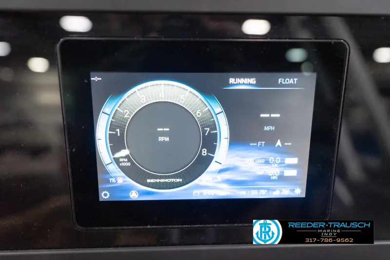 Slide: The Image of Dashboard display of a 2026 Bennington 22 ML boat showing RPM and speed metrics. - 49
