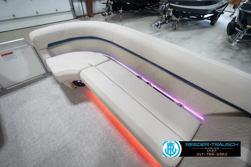 Slide: The Image of Luxurious seating on 2026 Bennington 22 ML pontoon boat with ambient LED lighting. - 54