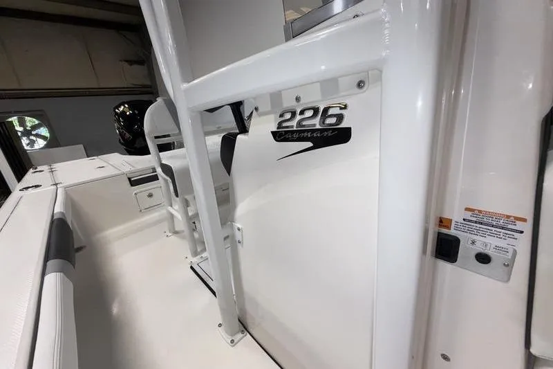 Slide: The Image of 2026 Robalo 226 Cayman boat interior with seating and model branding. - 15