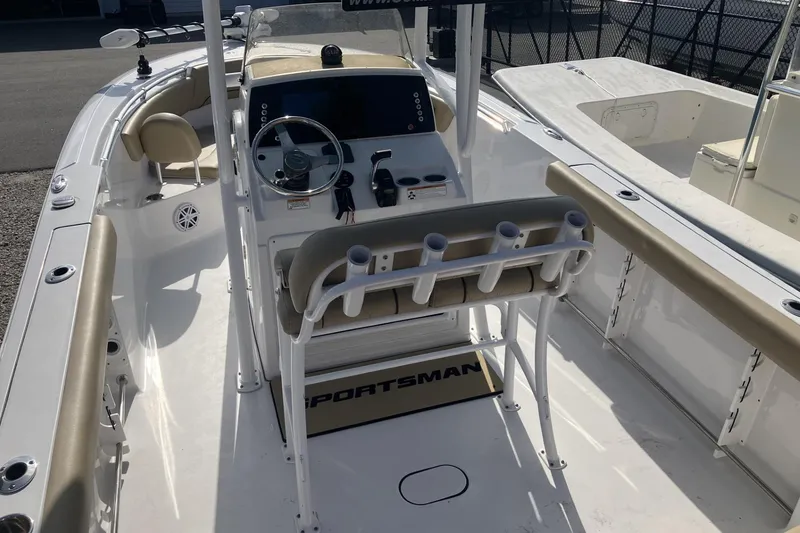 Slide: The Image of 2019 Sportsman Heritage 231 Center Console boat interior with steering wheel and seating. - 15