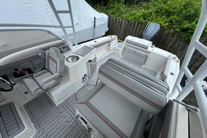 Slide: The Image of 2023 Solara S-250 DC boat interior with modern seating and sleek design. - 5