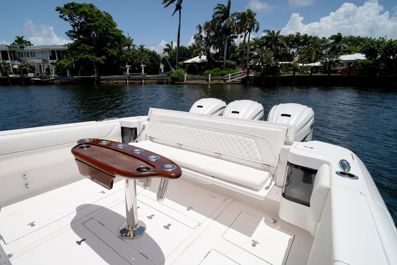 Slide: The Image of 2021 Intrepid 400 Center Console boat with luxurious seating and powerful engines. - 12