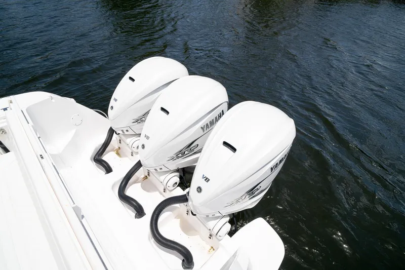 Slide: The Image of Triple Yamaha V8 engines on a 2021 Intrepid 400 Center Console boat. - 14
