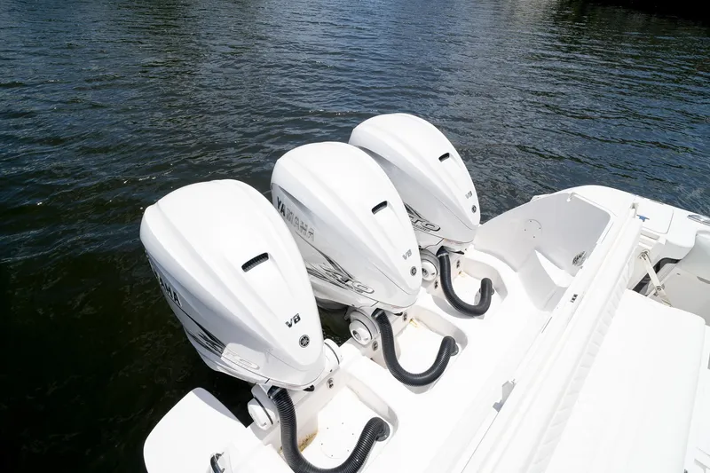 Slide: The Image of Triple Yamaha V8 engines on a 2021 Intrepid 400 Center Console boat. - 16