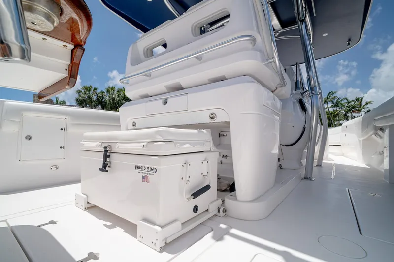 Slide: The Image of 2021 Intrepid 400 Center Console boat interior with storage and seating. - 20