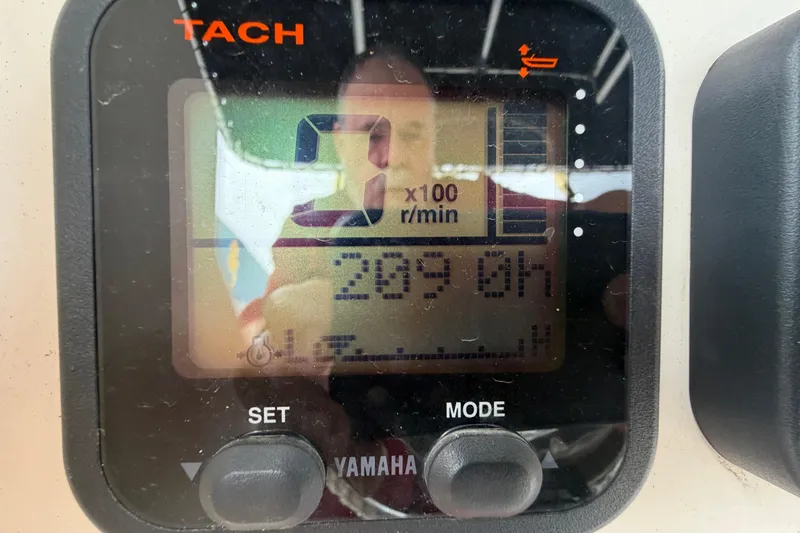 Slide: The Image of Close-up of Yamaha tachometer on 2008 Pursuit C 230 Center Console boat. - 17