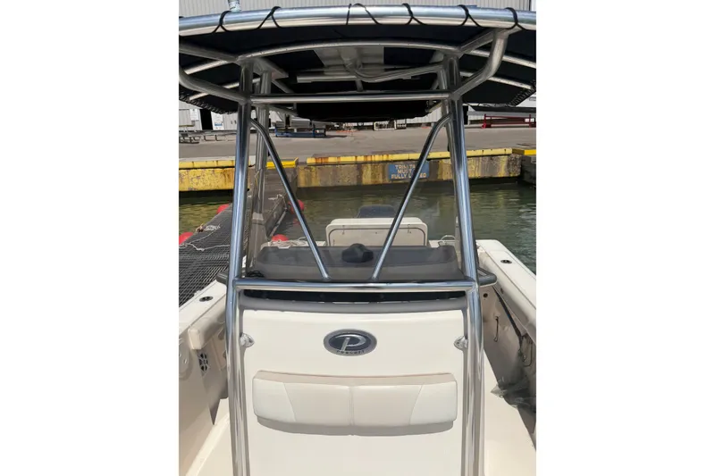 Slide: The Image of 2008 Pursuit C 230 Center Console boat docked at marina. - 62