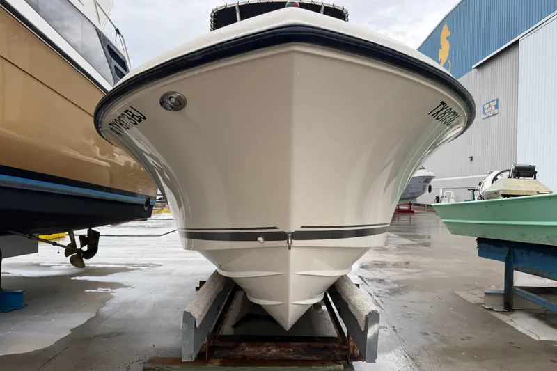 Slide: The Image of 2008 Pursuit C 230 Center Console on a dry dock. - 36