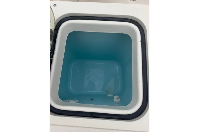 Slide: The Image of Livewell compartment of a 2008 Pursuit C 230 Center Console boat. - 8