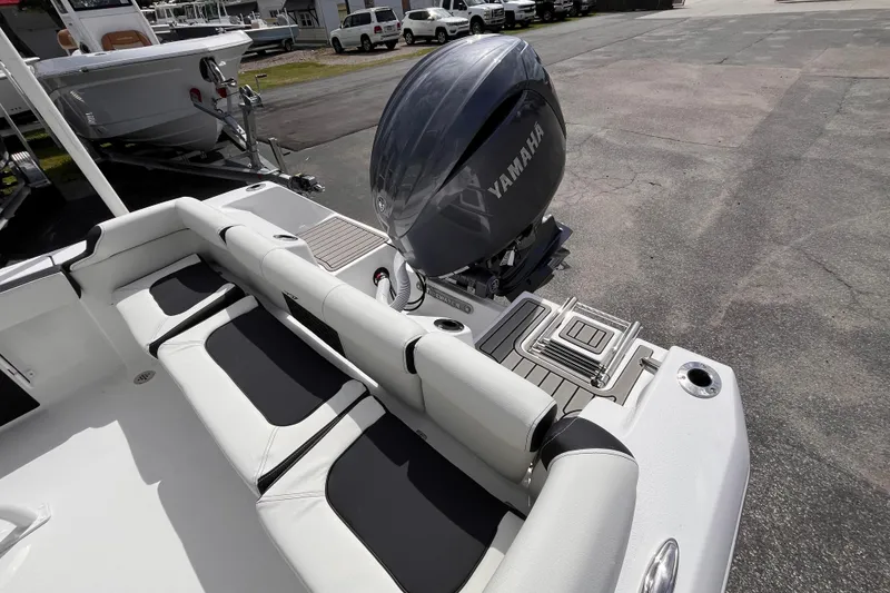 Slide: The Image of 2026 Tidewater 210 LXF boat with Yamaha engine, featuring sleek seating and modern design. - 15
