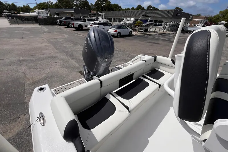 Slide: The Image of 2026 Tidewater 210 LXF boat with Yamaha engine, parked in dealership lot. - 5