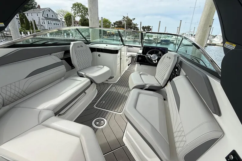 Slide: The Image of Interior of 2023 Sea Ray SLX 260 Outboard with luxurious seating. - 10