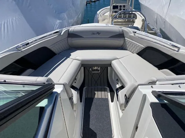 Slide: The Image of Interior of 2023 Sea Ray SLX 260 Outboard with luxurious seating. - 12