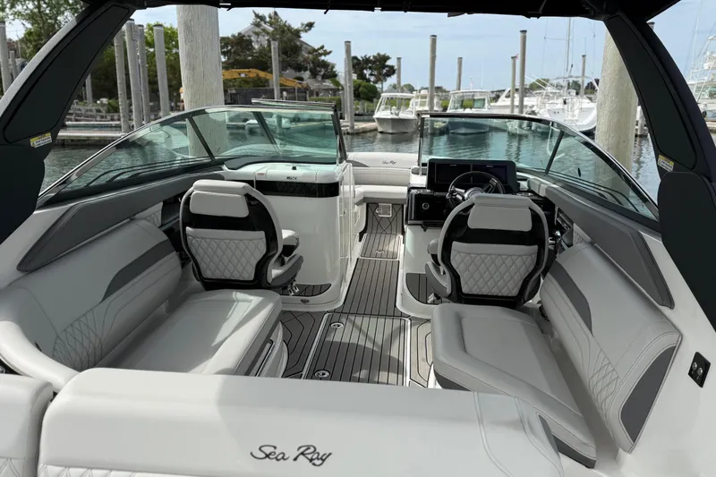 Slide: The Image of Interior of 2023 Sea Ray SLX 260 Outboard boat at dock. - 14