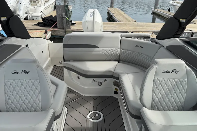 Slide: The Image of Interior of 2023 Sea Ray SLX 260 Outboard with luxurious seating. - 31