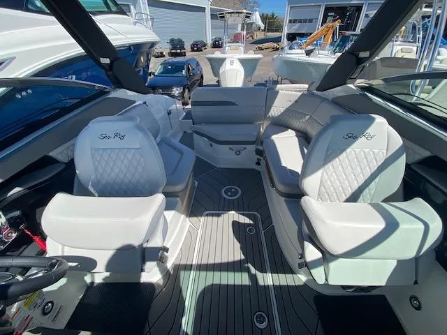 Slide: The Image of Interior of 2023 Sea Ray SLX 260 Outboard with luxurious seating. - 8