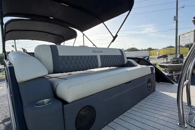 Slide: The Image of 2023 Barletta L23U pontoon boat with luxurious seating. - 9