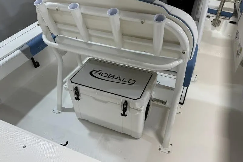 Slide: The Image of 2026 Robalo 246 Cayman with integrated cooler storage. - 12