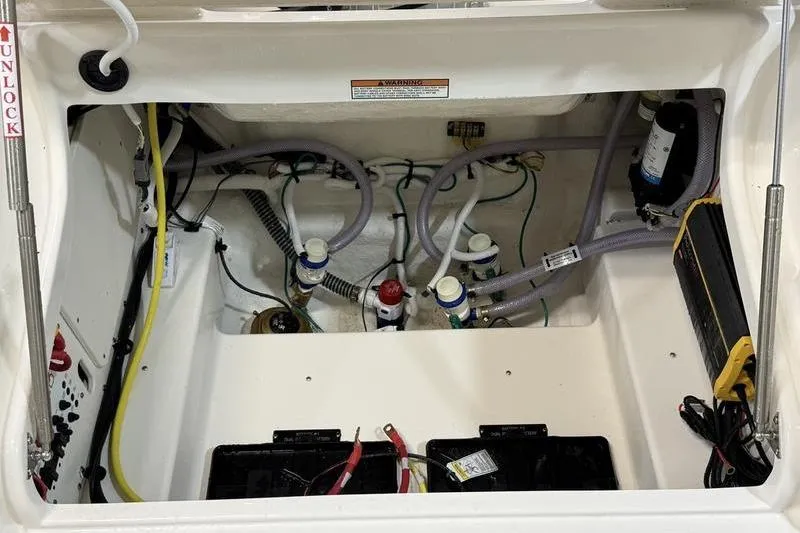 Slide: The Image of Interior view of 2026 Robalo 246 Cayman engine compartment. - 9