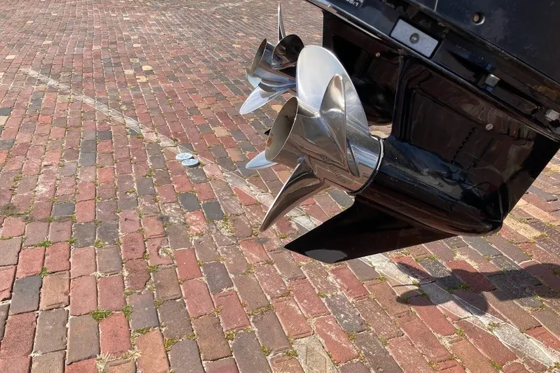 Slide: The Image of Propeller of a 2005 Donzi 35 ZF Daytona on brick pavement. - 11